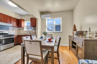 Welcome to this classic, all-brick semi-attached townhouse in - photo 8