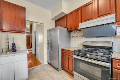 Welcome to this classic, all-brick semi-attached townhouse in - photo 10