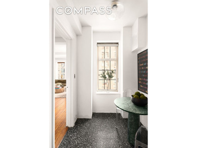 Welcome to this spacious corner one-bedroom, one-bathroom at - photo 3