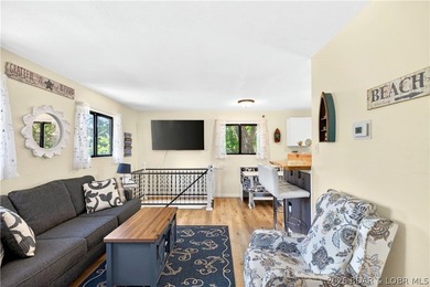 Tucked along a quiet cove at the 3 MM, 131 Walnut Drive is the - photo 12