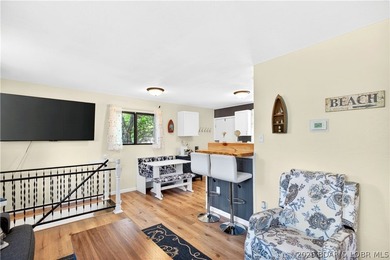 Tucked along a quiet cove at the 3 MM, 131 Walnut Drive is the - photo 13