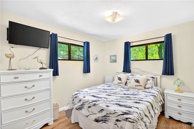Tucked along a quiet cove at the 3 MM, 131 Walnut Drive is the - photo 14