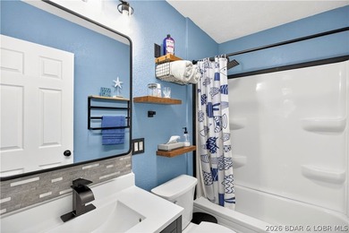 Tucked along a quiet cove at the 3 MM, 131 Walnut Drive is the - photo 16
