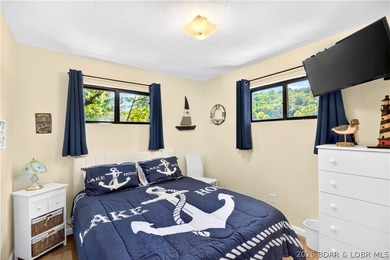 Tucked along a quiet cove at the 3 MM, 131 Walnut Drive is the - photo 17