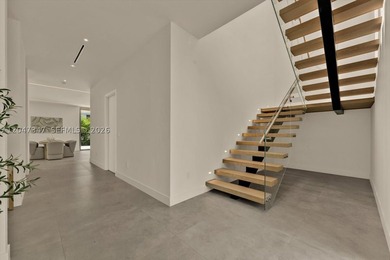 Introducing one of North Bay Island's newest completed spec - photo 17