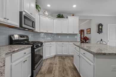 Welcome home to this stunning all-brick natural gas home nestled - photo 20