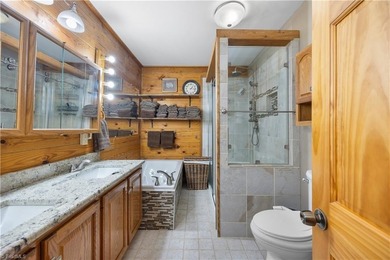 Nestled within the exclusive gated Lake Rhodhiss community of - photo 21