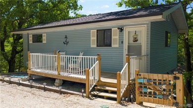 Tucked along a quiet cove at the 3 MM, 131 Walnut Drive is the - photo 26