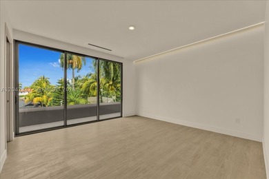 Introducing one of North Bay Island's newest completed spec - photo 26