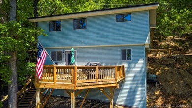 Tucked along a quiet cove at the 3 MM, 131 Walnut Drive is the - photo 30