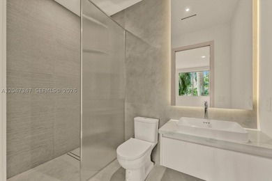 Introducing one of North Bay Island's newest completed spec - photo 30