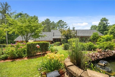 Nestled within the exclusive gated Lake Rhodhiss community of - photo 32