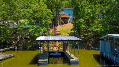 Tucked along a quiet cove at the 3 MM, 131 Walnut Drive is the - photo 33