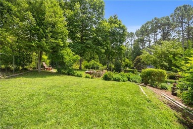 Nestled within the exclusive gated Lake Rhodhiss community of - photo 33