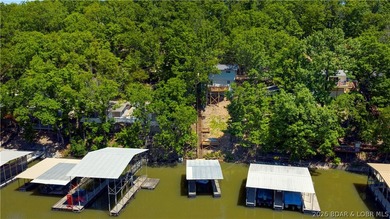 Tucked along a quiet cove at the 3 MM, 131 Walnut Drive is the - photo 37