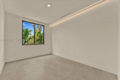Introducing one of North Bay Island's newest completed spec - photo 38