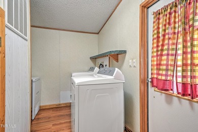 GORGEOUS WELL MAINTAINED double wide on permanent foundation - photo 22