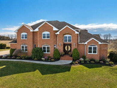 Beyond a long private drive and surrounded by over 20 acres - photo 1