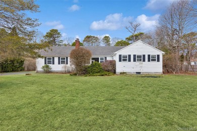 Located in the Rampasture Point section of Hampton Bays, this - photo 1