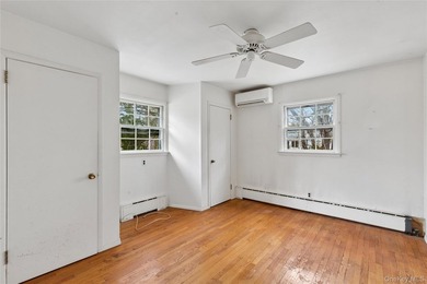 Located in the Rampasture Point section of Hampton Bays, this - photo 8