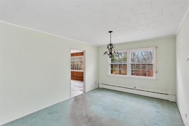 Located in the Rampasture Point section of Hampton Bays, this - photo 9