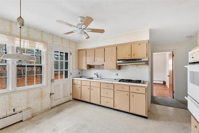 Located in the Rampasture Point section of Hampton Bays, this - photo 10