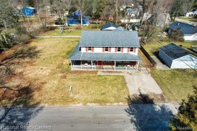 Lake Home For Sale in Wolverine Lake, Michigan