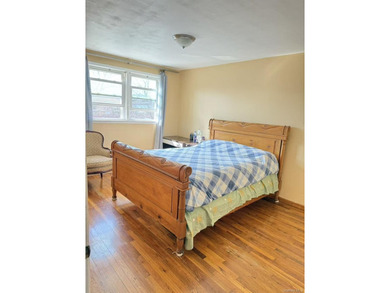 a well-maintained brick townhouse. This residence offers a solid - photo 4