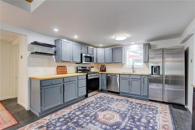 Tucked away on a rare 1.3-acre lot, this beautifully updated - photo 13
