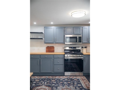 Tucked away on a rare 1.3-acre lot, this beautifully updated - photo 14