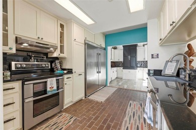 This inviting lakefront home is built for entertaining and - photo 14