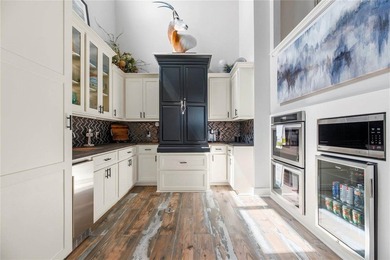 This inviting lakefront home is built for entertaining and - photo 16