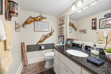 This inviting lakefront home is built for entertaining and - photo 23