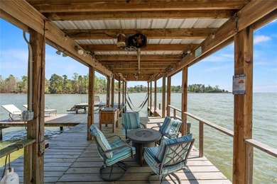 This inviting lakefront home is built for entertaining and - photo 39