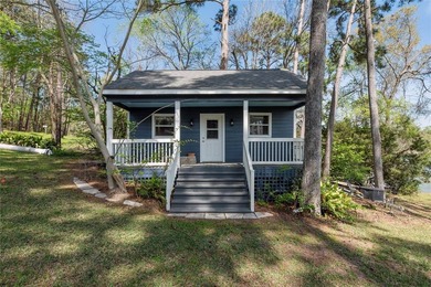 This inviting lakefront home is built for entertaining and - photo 44