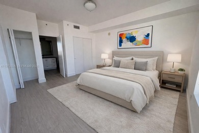 Bright corner unit at The Ivy Condominium featuring
