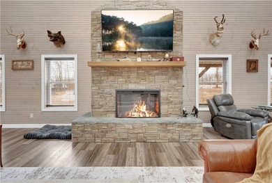 This expansive residence in Warsaw, MO, offers a harmonious - photo 11