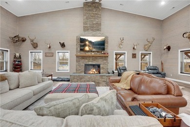 This expansive residence in Warsaw, MO, offers a harmonious - photo 12