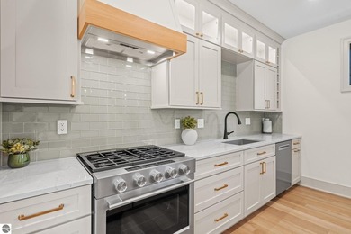 Experience elevated luxury in this brand-new, ground-floor condo - photo 12