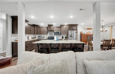 This expansive residence in Warsaw, MO, offers a harmonious - photo 13