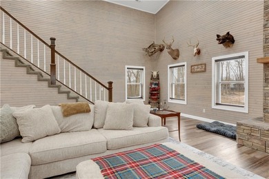 This expansive residence in Warsaw, MO, offers a harmonious - photo 14