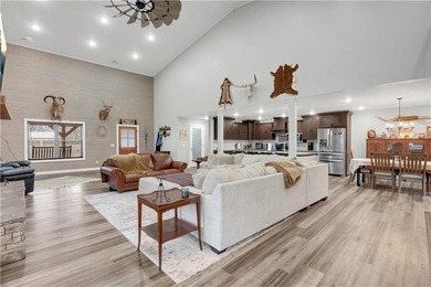 This expansive residence in Warsaw, MO, offers a harmonious - photo 16