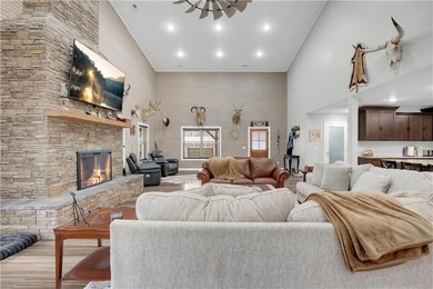 This expansive residence in Warsaw, MO, offers a harmonious - photo 17