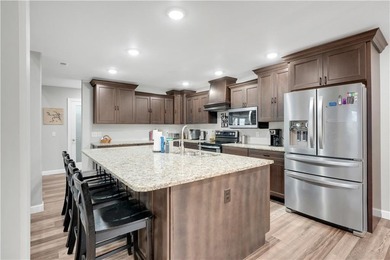 This expansive residence in Warsaw, MO, offers a harmonious - photo 19