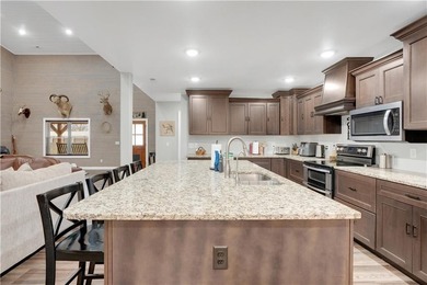 This expansive residence in Warsaw, MO, offers a harmonious - photo 20