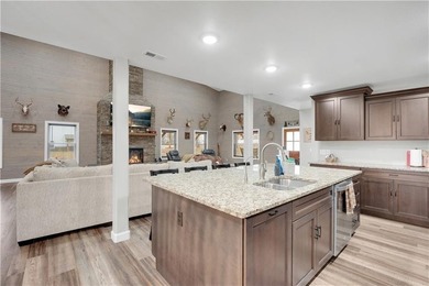 This expansive residence in Warsaw, MO, offers a harmonious - photo 22