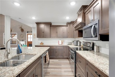 This expansive residence in Warsaw, MO, offers a harmonious - photo 23