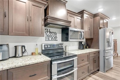 This expansive residence in Warsaw, MO, offers a harmonious - photo 24