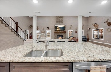 This expansive residence in Warsaw, MO, offers a harmonious - photo 27