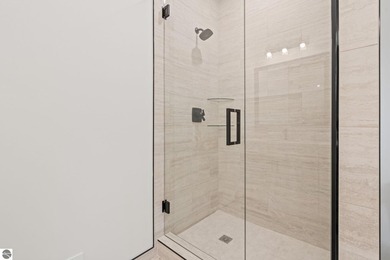 Experience elevated luxury in this brand-new, ground-floor condo - photo 27